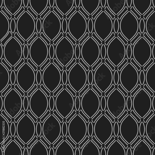 Seamless vector ornament. Modern background. Geometric modern dotted black and white pattern