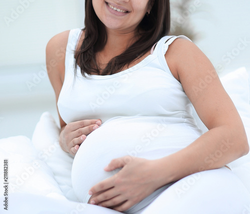 portrait of a happy pregnant woman. Free Download portrait of a happy pregnant woman. - GFXLoad