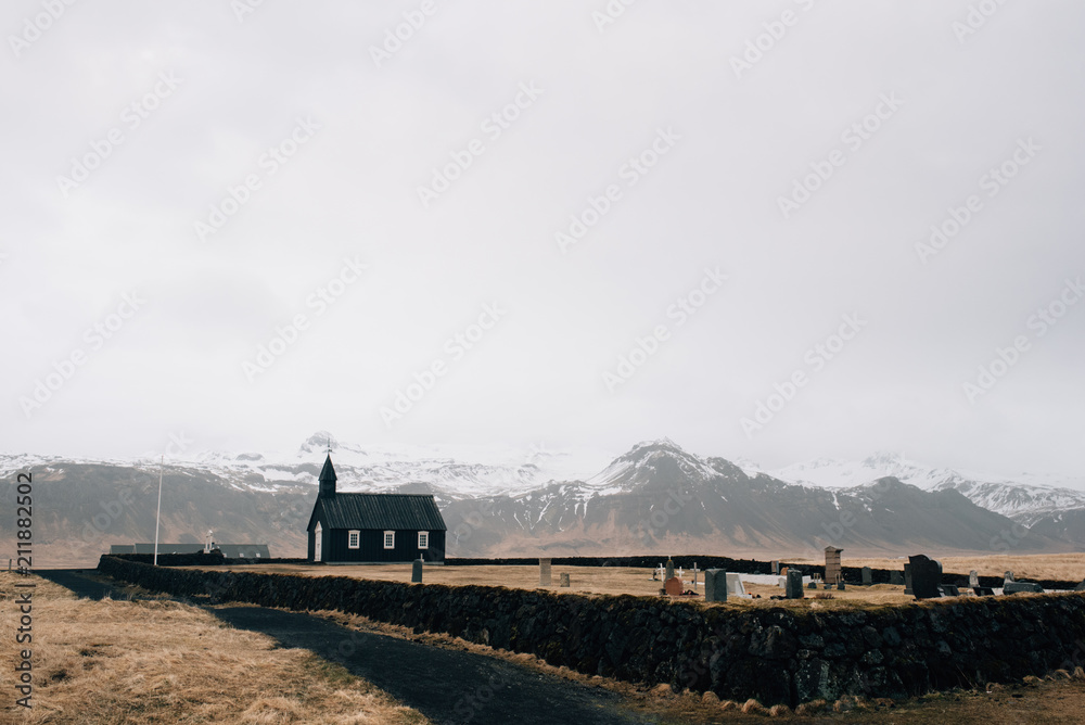 Fototapeta premium Budakirkja, this is a black wooden church in Budir at he Snaefellsnes peninsula in Iceland