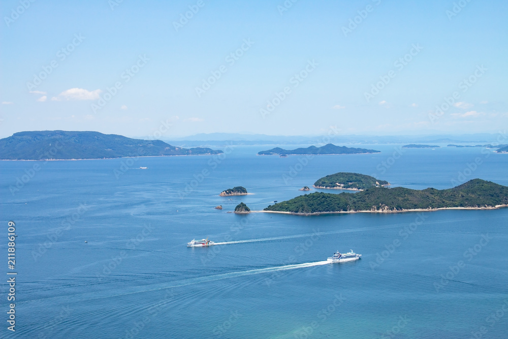 Obraz premium Ferryboats passing by one another on the seto inland sea,Takamatsu,Kagawa,shikoku,japan