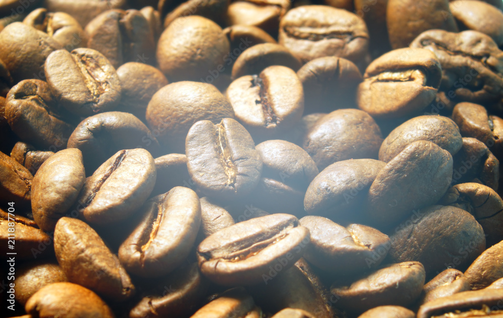 Roasted coffee beans close up.