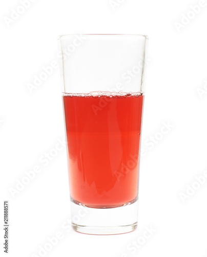 Tall glass of juice isolated