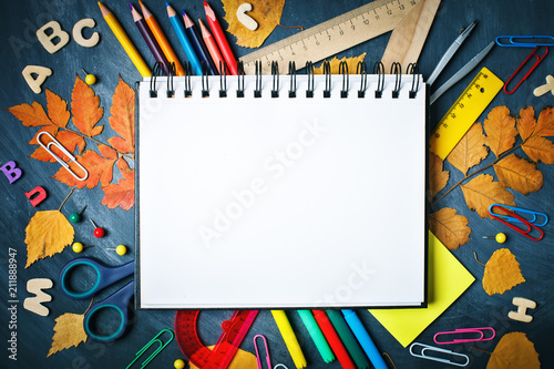 Back to school background with school supplies.View from above.