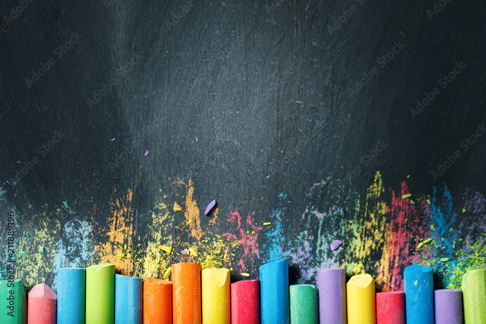 Colorful crayons on the blackboard, drawing. Back to school background. - obrazy, fototapety, plakaty 
