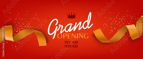 Grand opening red banner design with gold ribbon, crown and confetti. Festive template can be used for invitation cards, flyers, posters. photo