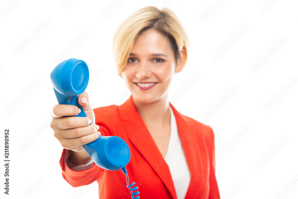Selected focus of young business woman showing blue receiver. Selected focus of young business woman showing blue receiver.