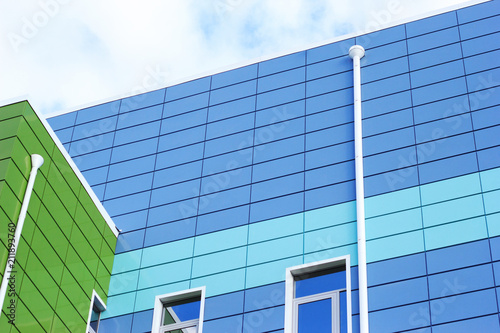 Wallpaper Mural Part of modern green and blue building, a view from the bottom in perspective Torontodigital.ca