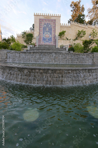 Cascade fountain in Heydar Aliyev square on the background of a mosaic mosaic in the form of a carpet. Kiev. Ukraine photo