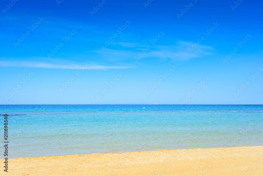 European sandy beach and blue sea.