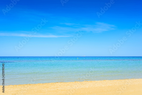 European sandy beach and blue sea.