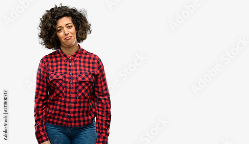 Beautiful arab woman with sad and upset expression, unhappy