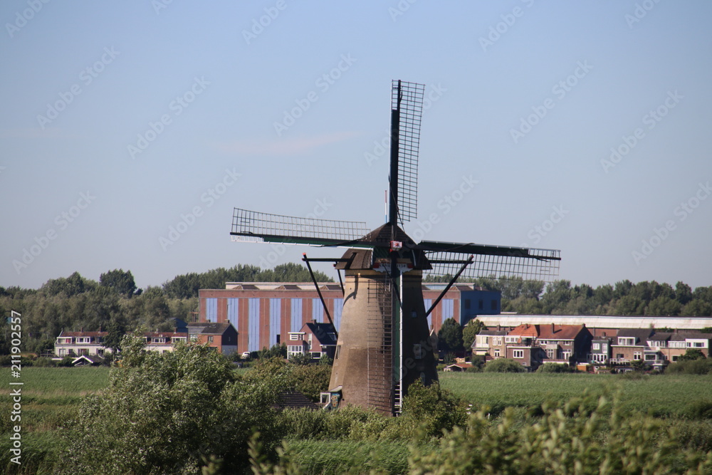 Fields with windmills at Kinderwijk in the Netherlands. Fields with windmills at Kinderwijk in the Netherlands.