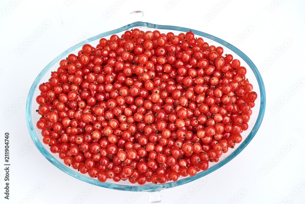 Ripe juicy red currant berries. top view, isolated on white background. Close-up. Ripe juicy red currant berries. top view, isolated on white background. Close-up.