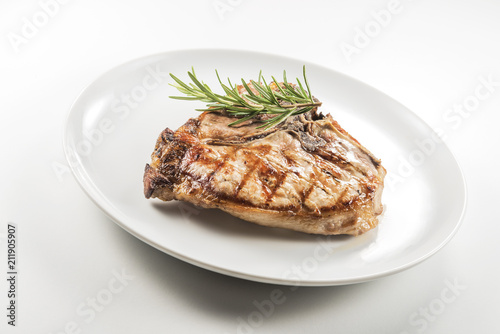 Grilled t-bone chop of pork