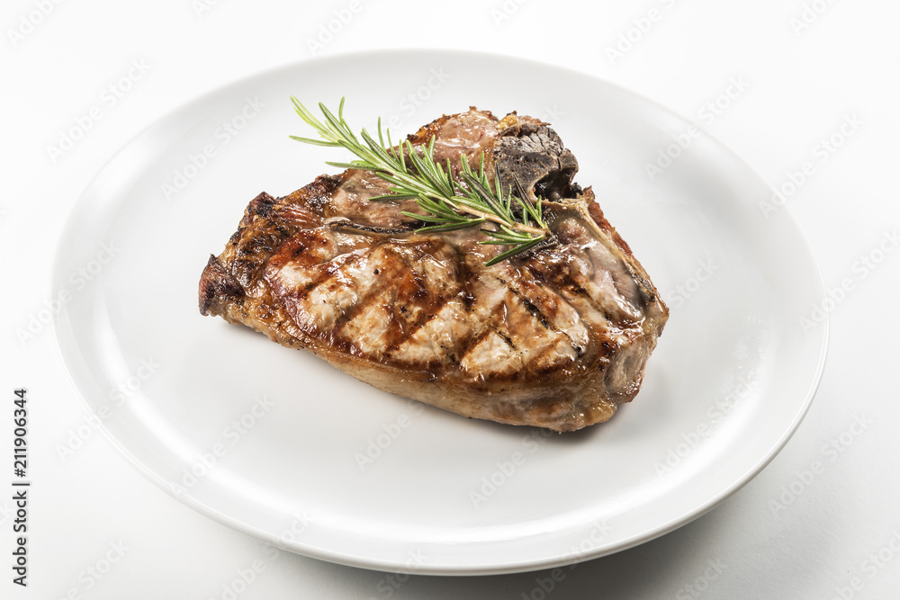 Grilled t-bone chop of pork