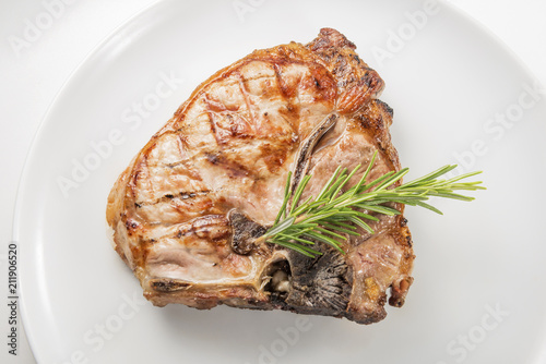 Grilled t-bone chop of pork