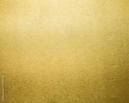 Golden texture background. Paper glitter material.