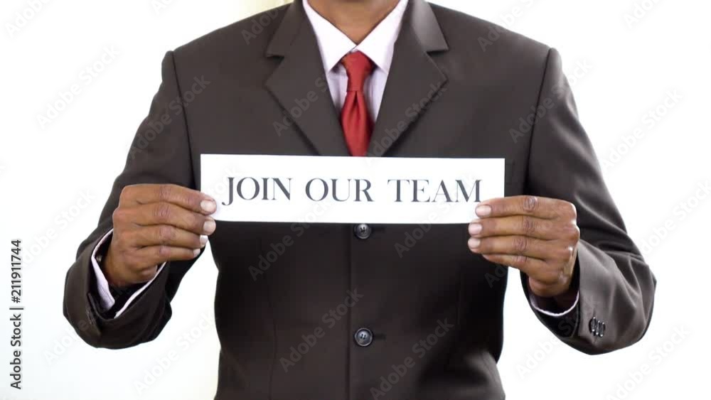 Businessman holding white card with Join our team sign