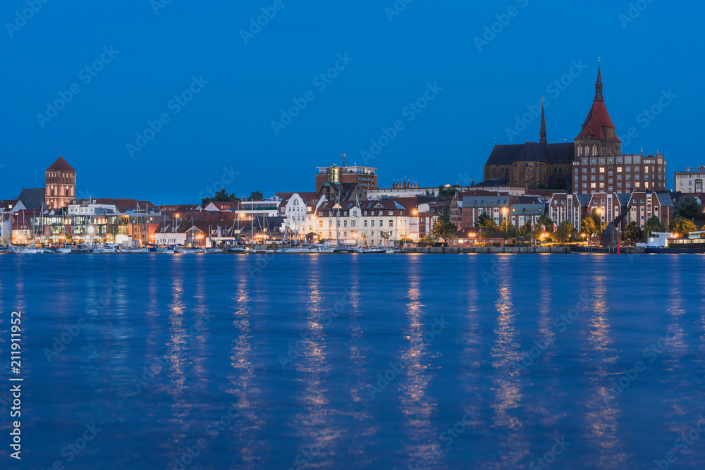 Rostock. Night Panorama view to Rostock in Germany. River Warnow and City port.