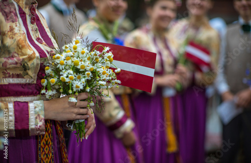 Song and dance festival in Latvia. Procession in Riga. Elements of ornaments and flowers. Latvia 100 years. photo