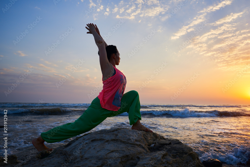 Young Woman Yoga On The Beach At Sunset Scorpion Pose Stock Photo -  Download Image Now - iStock