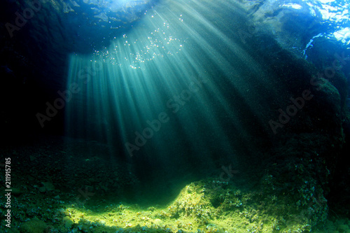 Sunlight in underwater cave 