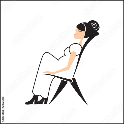 Pregnant woman on a chair