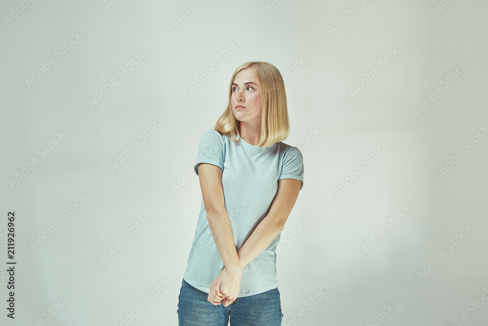 Beautiful woman looking suprised and bewildered Beautiful woman looking suprised and bewildered