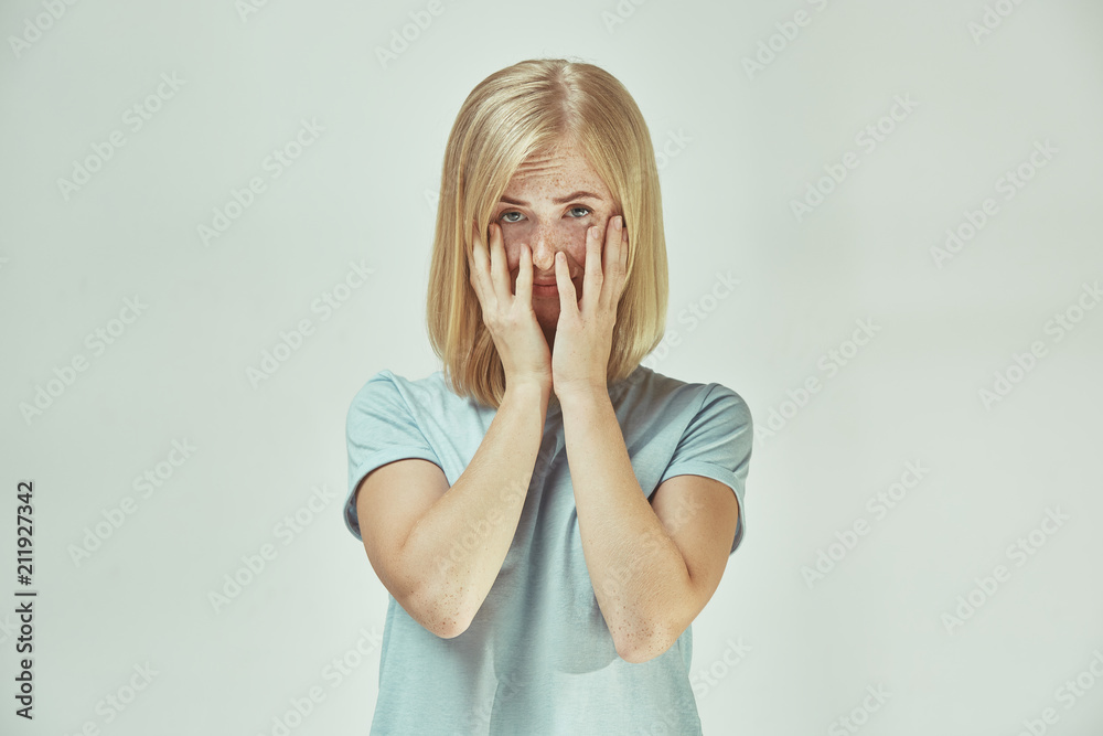 Beautiful woman looking suprised and bewildered Beautiful woman looking suprised and bewildered