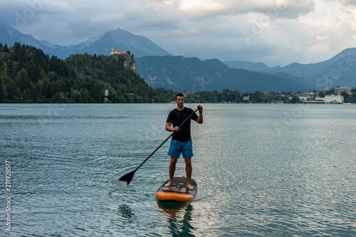 stand up paddle boarding on the lake