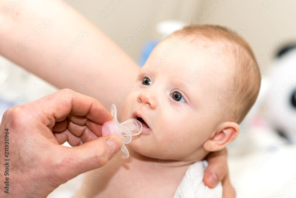 Baby and pacifier Baby and pacifier