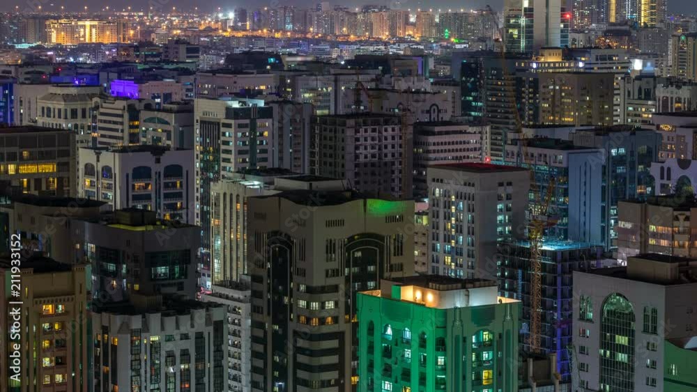 Aerial skyline of Abu Dhabi city centre from above night timelapse Aerial skyline of Abu Dhabi city centre from above night timelapse