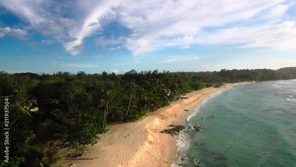 Aerial drone video of a scenic white sand beach of Burgos, Pangasinan in the Philippines, Southeast Asia. Aerial drone video of a scenic white sand beach of Burgos, Pangasinan in the Philippines, Southeast Asia.