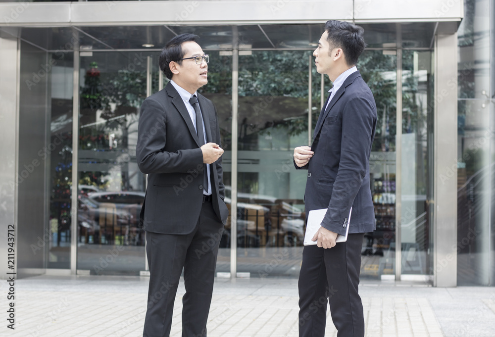 two business talking with partner about business and investment on way to office two business talking with partner about business and investment on way to office