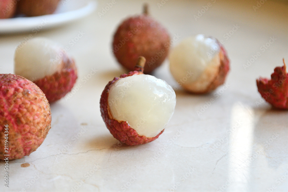 Fresh and juicy lychees on neutral background. Fresh and juicy lychees on neutral background.