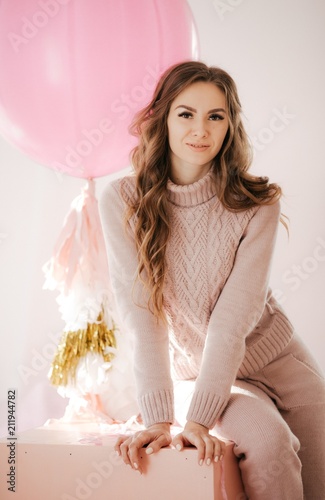 Photo of beautiful young woman with big balloons  photo