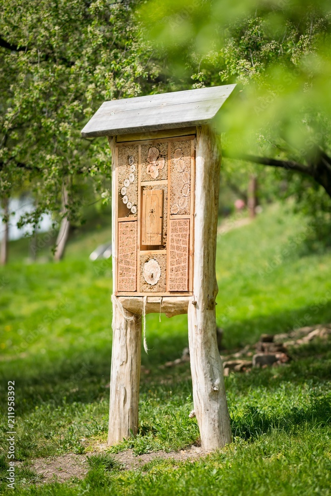 Insect hotel - wooden house made for bugs and solitary insect (bees, wasps,...) Insect hotel - wooden house made for bugs and solitary insect (bees, wasps,...)
