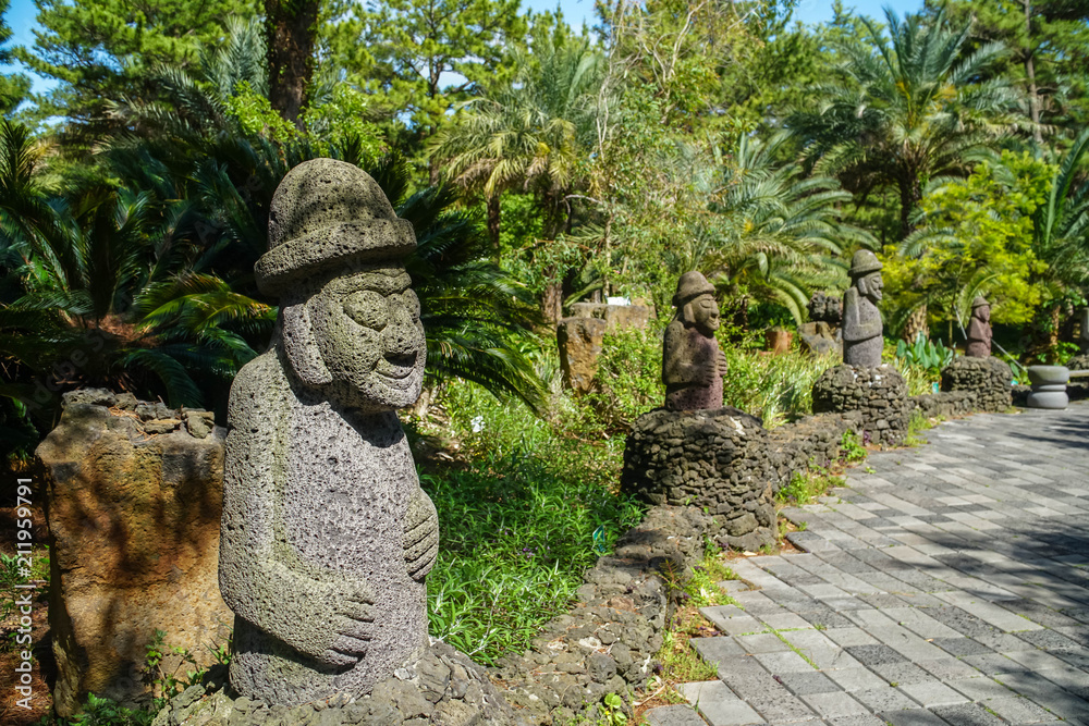 Dol hareubang, also called tol harubang, hareubang, or harubang - Traditional Statue Guard of Jeju Island in South Korea. Sculpture Made of Volcanic Rock Dol hareubang, also called tol harubang, hareubang, or harubang - Traditional Statue Guard of Jeju Island in South Korea. Sculpture Made of Volcanic Rock