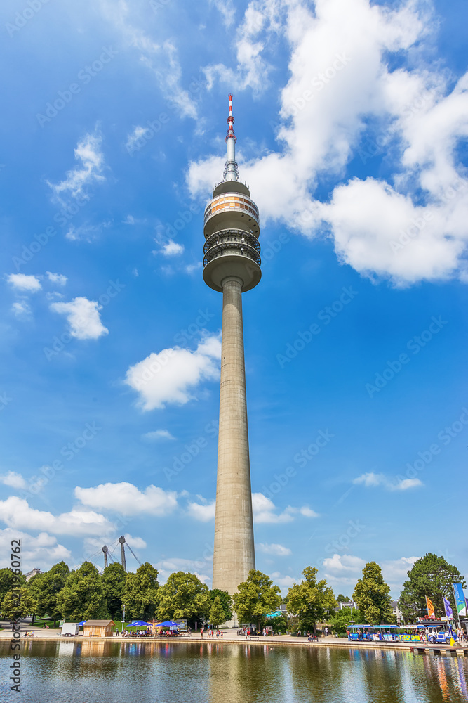Munich, Germany - June 09, 2018: A low angle view of the Olympic Tower (Olympiaturm) in the Olympic Park in Munich, Germany.