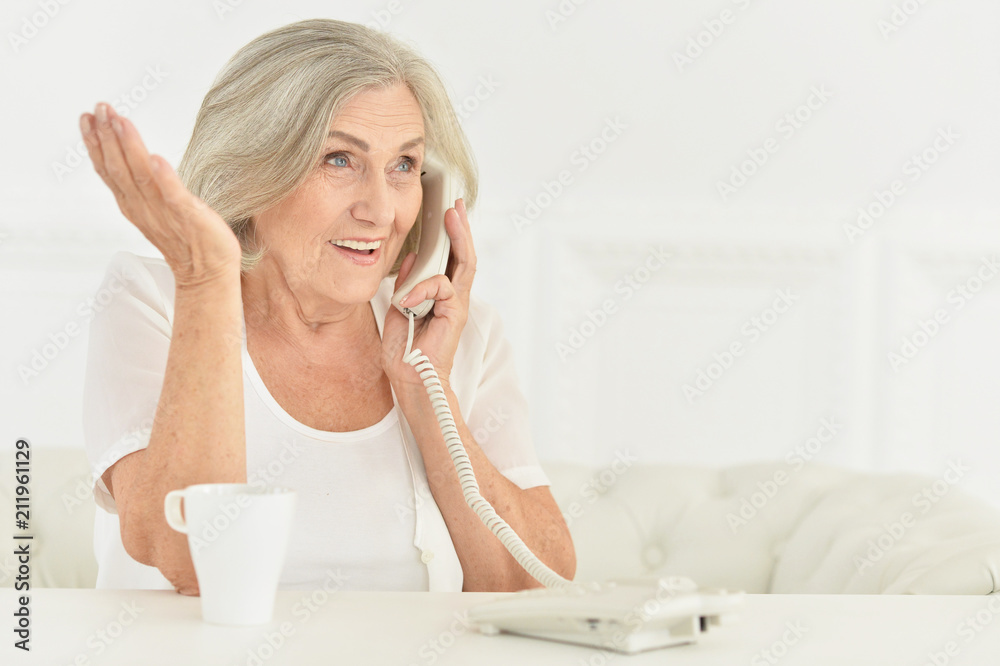Senior woman talking phone Senior woman talking phone