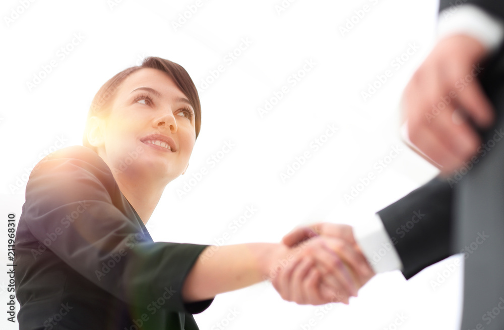 background image of business partners handshaking.close-up. background image of business partners handshaking.close-up.