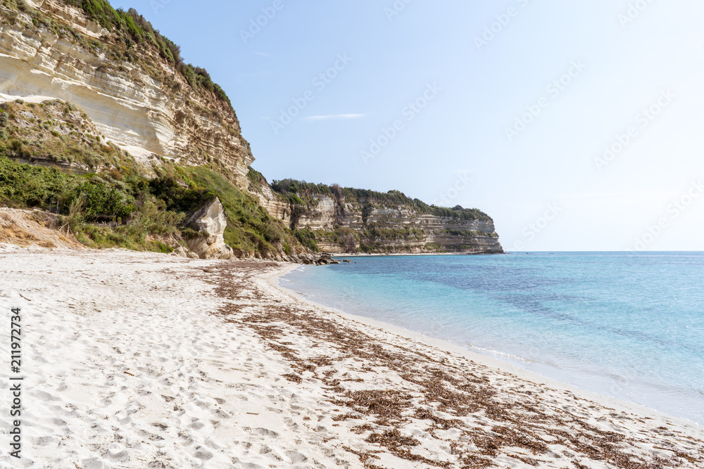 Beautiful empty sandy beach and turquoise sea Beautiful empty sandy beach and turquoise sea