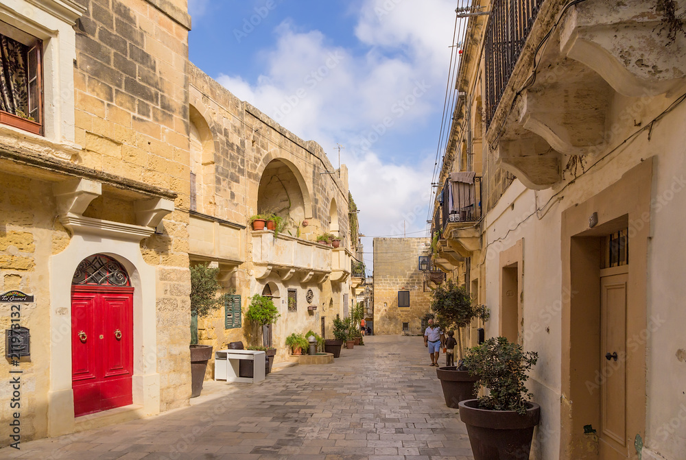 Victoria, the island of Gozo, Malta. Old Narrow street (Triq id-Dejqa)