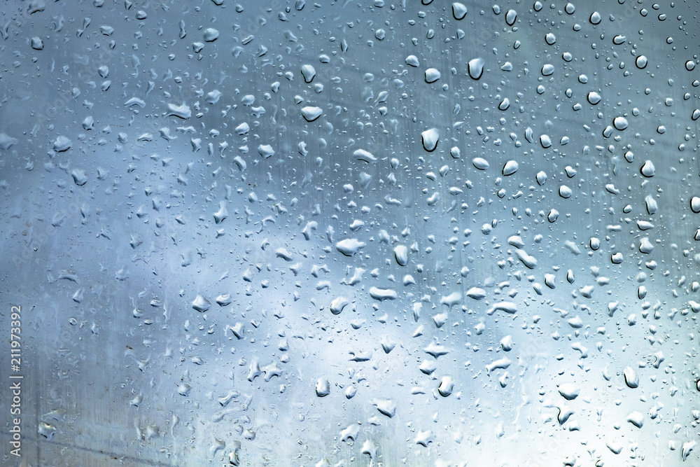 Drops on glass against the sky Drops on glass against the sky