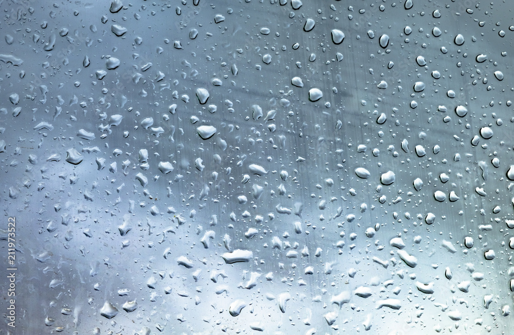 Drops on glass against the sky Drops on glass against the sky