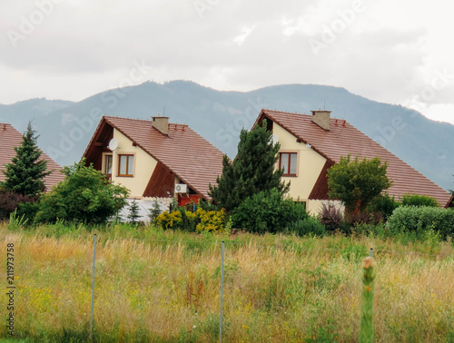 lodges in the mountains in summer photo