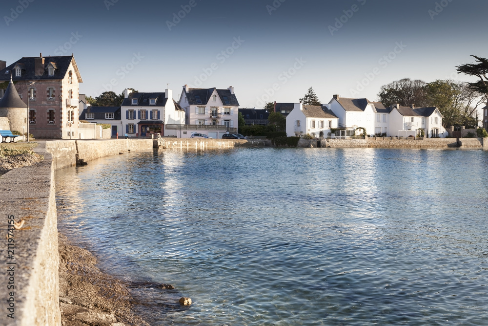 Small harbor with beautiful village in dusk, Moabren, Brittany, France