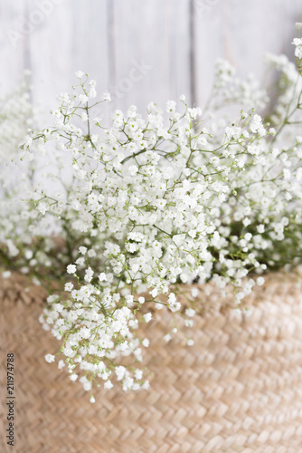 Soft home decor, small vases with baby's breath bouquet. Interior. photo