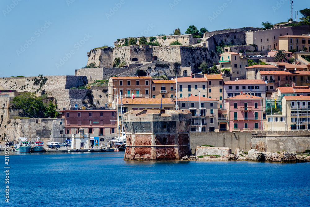 The town of Portoferraio seen from the Ferry coming from Piombino. Portoferraio is a town and comune in the province of Livorno, on the edge of the eponymous harbour of the island of Elba. 
