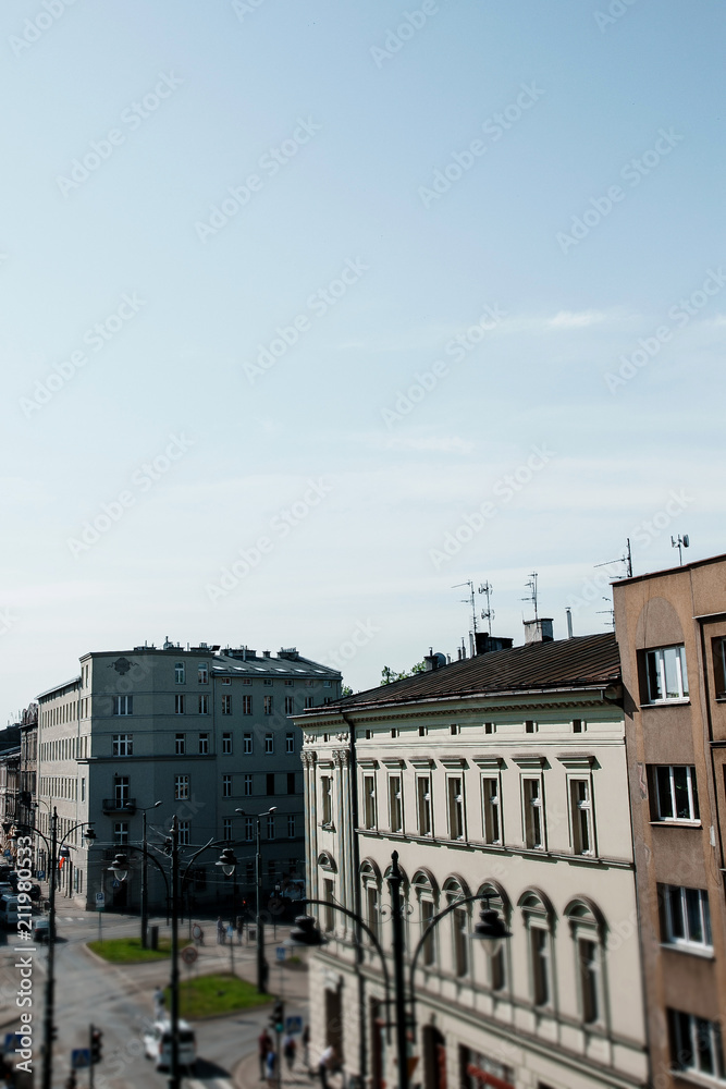 Obraz premium Street of the city of Krakow. The old Town. Public transport on the streets. Trams and buses. Polesha. City center.
